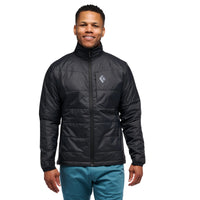 Man wearing a black jacket with a brand logo on a white background