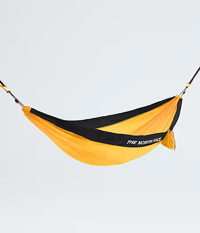 Yellow and black hammock with 'The North Face' logo on a light gray background
