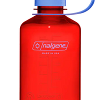 Red Nalgene water bottle with a blue cap on a white background