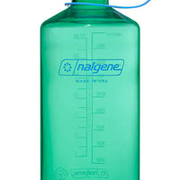 Green Nalgene water bottle with blue cap on a white background