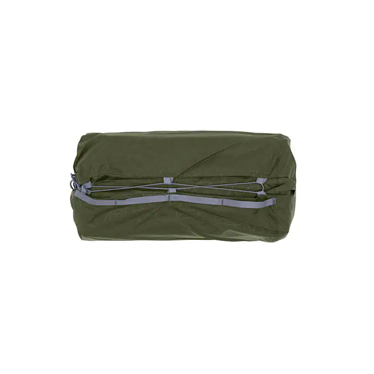 Green compression bag with gray straps on a white background