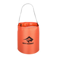Orange bucket with a handle and Sea to Summit logo on a white background