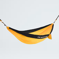 Yellow and black hammock with 'The North Face' logo on a light gray background
